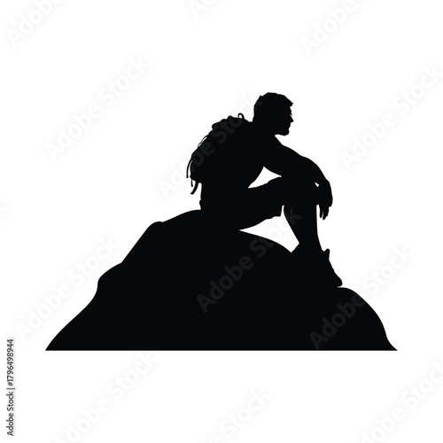Silhouette of a Hiker Sitting on a Rock, Representing Adventure, Mountain Climbing, and Rest