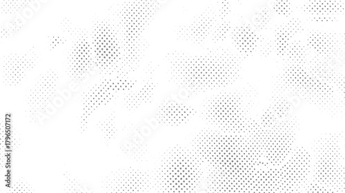 Abstract grey halftone dots pattern scattered on a clean white background creating a subtle textured effect