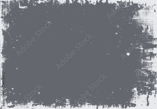 Distressed textured grunge overlay with rough uneven edges and speckled imperfections on a solid gray background