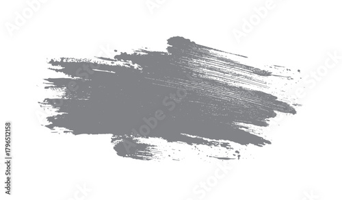 Textured gray paint brush stroke splash with splatters and streaks on white background abstract graphic element
