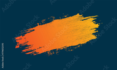 Textured orange and yellow gradient brush stroke on dark blue background with speckles abstract