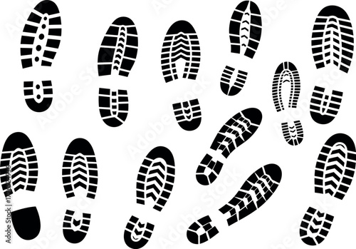 Collection of black shoe prints on a white background