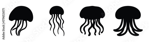 Four black jellyfish silhouettes with flowing tentacles for marine life graphics