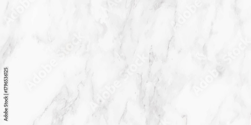 A close up view of a white marble texture reveals subtle grey veining patterns across the stone surface