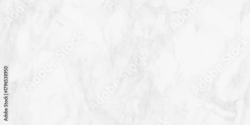 A close up view of a white marble texture displays delicate veining and subtle patterns creating an elegant background