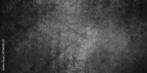 A dark textured abstract background with mottled gray and black tones creating a gritty and atmospheric visual