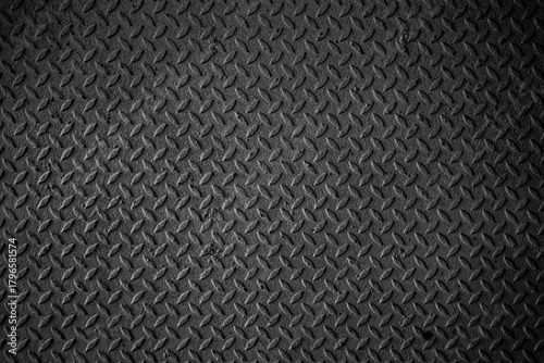 Wallpaper Mural A black and white photo of a metal surface with a pattern of squares Torontodigital.ca