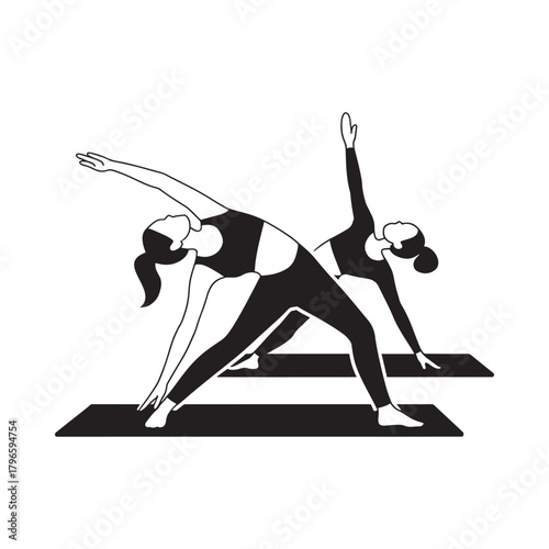 Two women practicing extended triangle pose on yoga mats