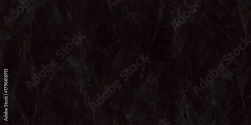 A dark textured background displaying a complex pattern of interwoven lines and subtle tonal variations in black