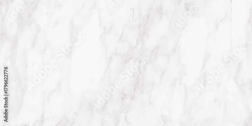 A close up view of a white marble texture showcasing delicate grey veining and a polished surface