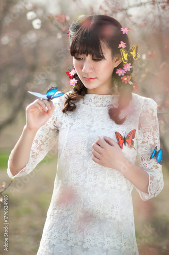 Eastern women photographed outdoors in spring	