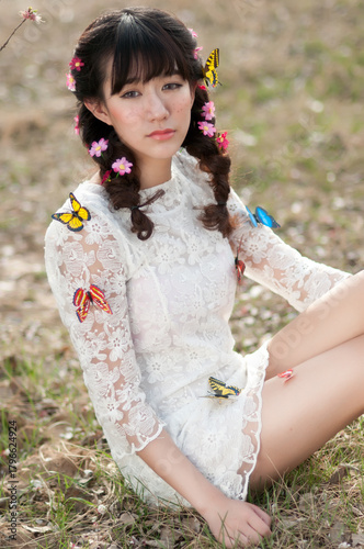 Eastern women photographed outdoors in spring	