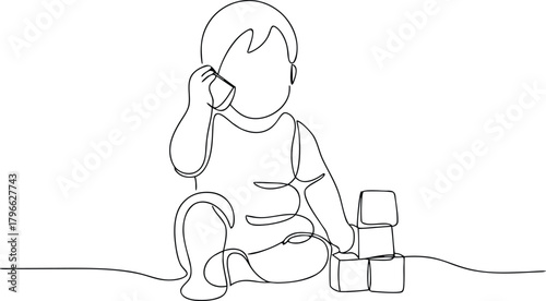 Baby playing with blocks and a cup child