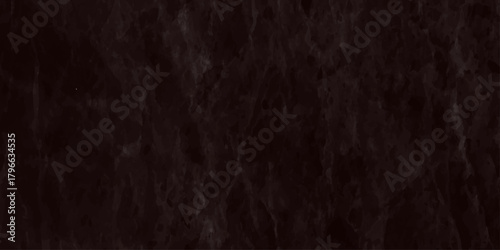 A darkly textured close up image reveals a dense almost chaotic arrangement of thin dark strands or fibers