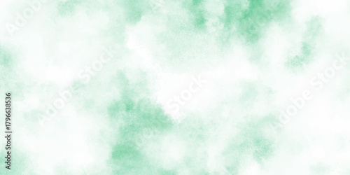 Abstract mint green watercolor texture background with soft cloudy and turquoise tones blended into cloudy, diffused splashes.	