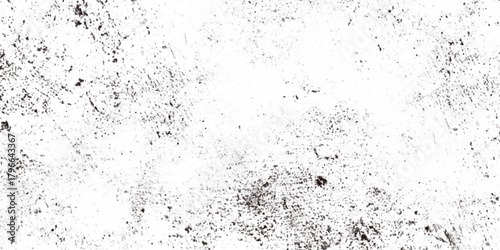 Rough grainy grunge texture featuring distressed speckles and various black particles are surrounding the white background, faded details, and raw vintage surface perfect for edgy design projects.