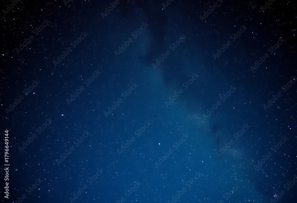 Obraz premium Vast, glittering night sky; Milky Way stretches across, countless stars , mysterious, cosmos