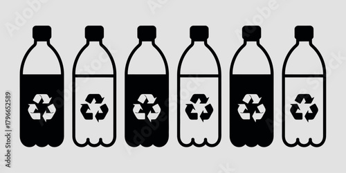 Row of plastic bottles with recycling symbols on a gray background