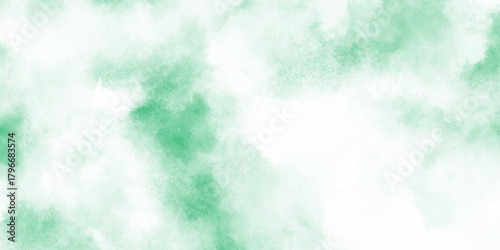 Abstract mint green watercolor texture background with soft cloudy and turquoise tones blended into cloudy, diffused splashes.