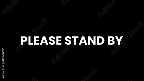 Clean 'PLEASE STAND BY' 4K animation with a transparent background. Perfect for video social media content.