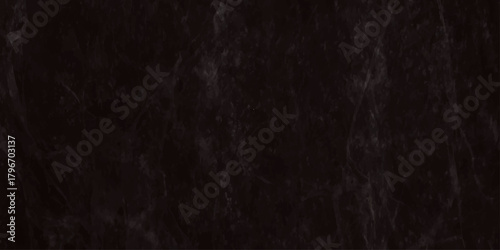 Moody stained blurry charcoal empty plaster wall or black board or chalk board texture featuring soft gradients, subtle depth, and atmospheric abstract surface details.