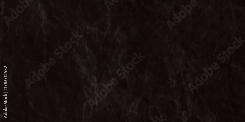Dark gray and black marble texture background with deep natural veins and a rough sophisticated stone surface elegant texture conveying a sense of luxury.