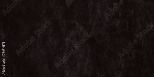 High resolution texture of a very dark nearly black slate or marble stone surface It features subtle veining and a rugged, weathered.