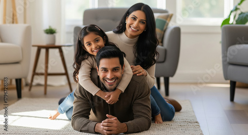 Happy Indian Family Posing Together in Modern Living Room