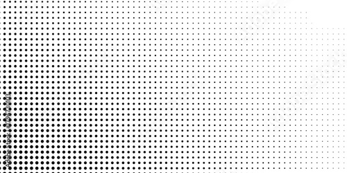 Dotted abstract halftone gradient texture. Vanishing polka dot background. Repeating dots gradation pattern simple design