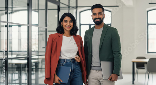 Diverse Business Professionals Smiling Confidently in Modern Office