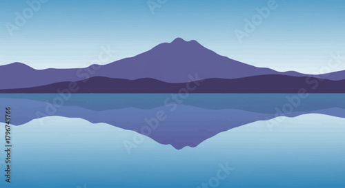 Serene mountain landscape reflecting in calm water with a gradient blue sky offering peace