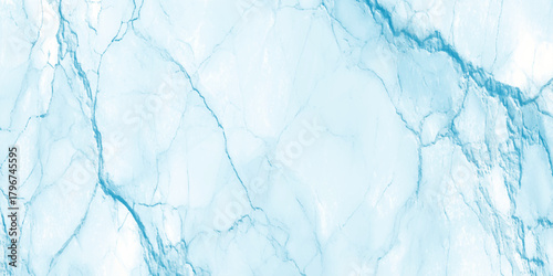 Soft blue marble quartz stone texture background with turquoise and cyan veins and light white areas, elegant natural pattern.	