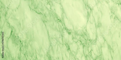 vibrant green marble or quartz stone texture background with dark contrasting veins and bright lime gradient, natural mineral pattern.