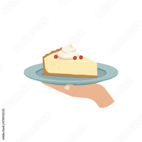 Slice of cheesecake with whipped cream on blue plate held by hand  