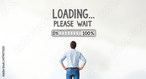Person standing in front of wall with LOADING PLEASE WAIT message and empty progress bar, symbolizing anticipation and digital delay