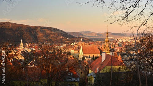 Views of the medieval town of Sighisoara, a UNESCO World Heritage Site, in the light of a winter sunset.