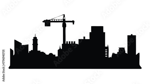 Silhouette of a city skyline with a crane and tall buildings