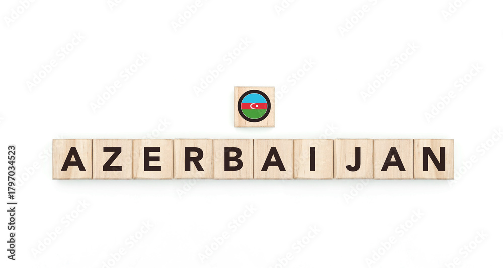 Obraz premium Wooden blocks bearing the name and flag of Azerbaijan. Azerbaijani and Asian Culture, national identity, travel, and geography in a copy space design.