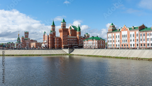 View of the embankment of the Malaya Kokshaga River and the building of the puppet theater in the city of Yoshkar-Ola