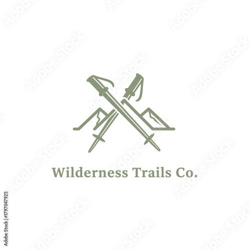 A logo design with crossed trekking poles and stylized mountains, in a muted green color