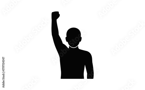 A silhouette of a person raising their fist,
