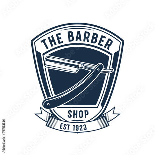 A dark blue barber shop logo featuring a straight razor inside a shield with text above and below