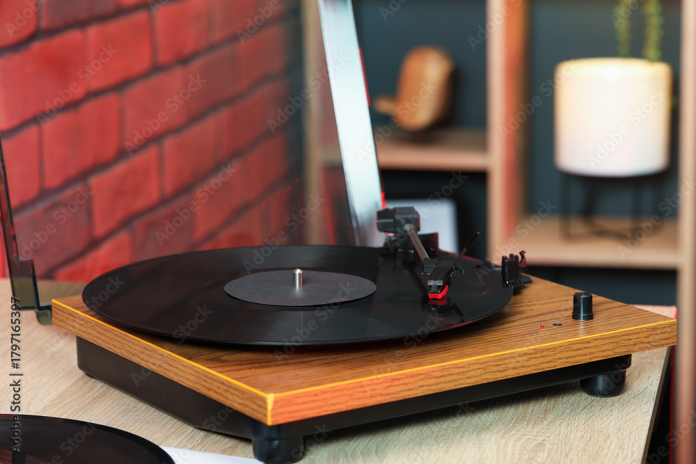 Obraz premium Modern turntable with vinyl record at home, closeup