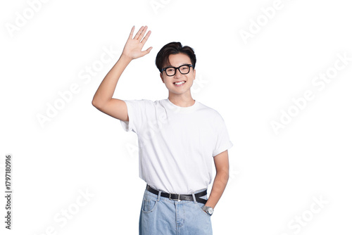 Friendly Hello: A young man exudes warmth and positivity as he offers a cheerful greeting, embodying approachability and kindness with a friendly wave.