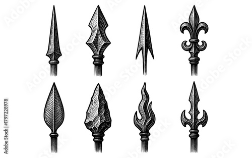 Intricate vintage spearhead designs: detailed engraved weapon art collection