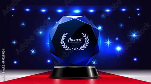 Elegant blue crystal award trophy presented on a red carpet against a luminous, starry background.