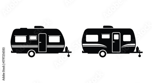 Two black and white rv camper trailers isolated on white background
