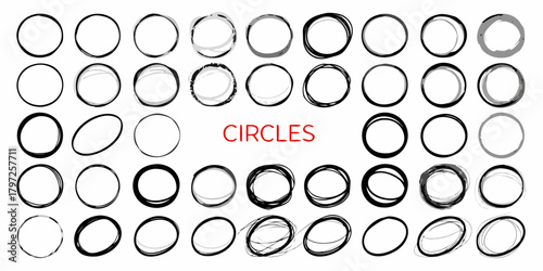 Collection of hand drawn circles and ellipses in black and gray brush strokes on white background