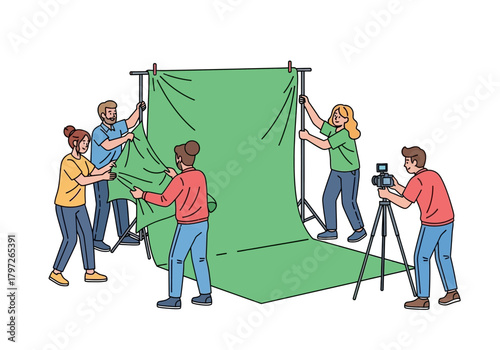 Film Crew Setting Up Green Screen Backdrop for Video Production