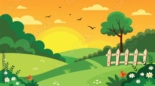 Sunset over green field with fence and trees